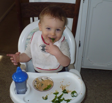 David eating spinach and hummus